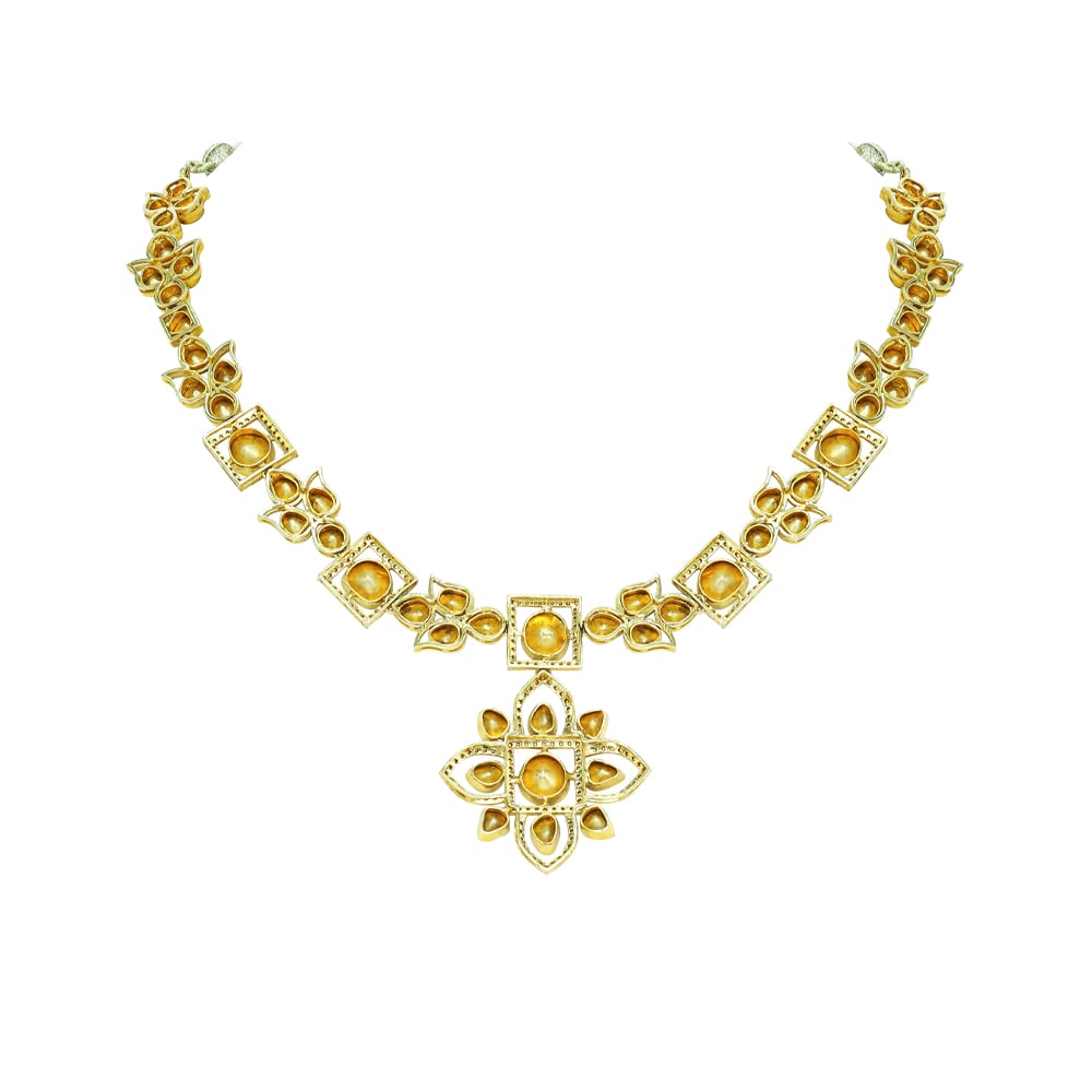 Polki Necklace with Floral Motifs and Lotus-Inspired Pendant
